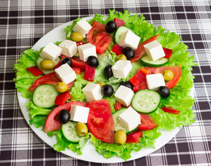 Greek salad on white plate