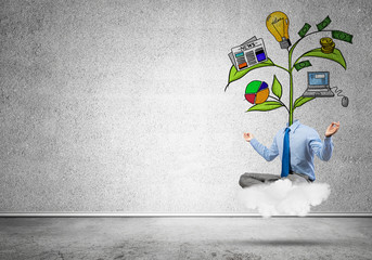 Headless businessman meditating