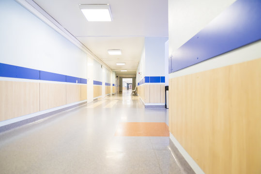 long corridor in hospital with chairs