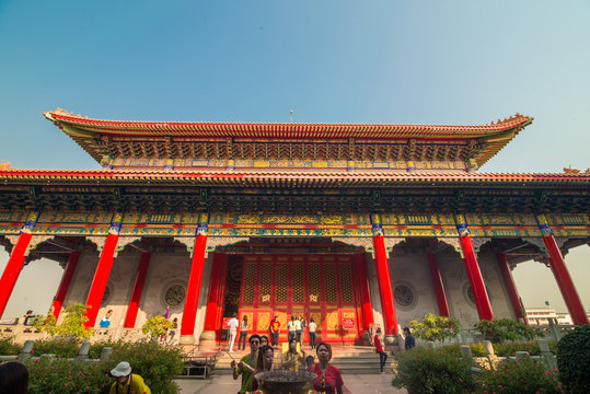 Chinese temple against blue sky in Thailand.