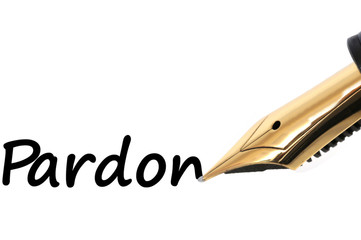 Le mot pardon écrit au stylo plume
