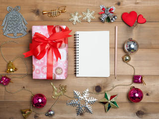 Top view  , Flat lay  Christmas decoration with wood background . cute object  decorate .
