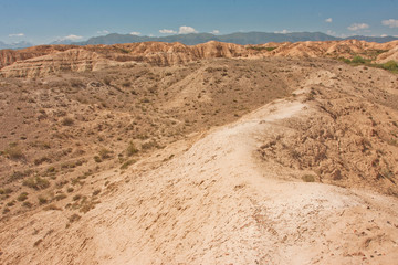 Trail on the hill with dry soil