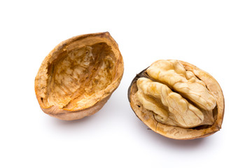 Walnut and walnut kernel isolated on the white background.