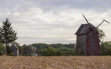 Kawnice, Poland. Old ruined windmill on the field.