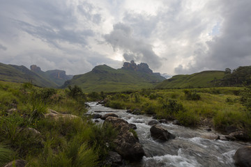 Mountain stream and clouds