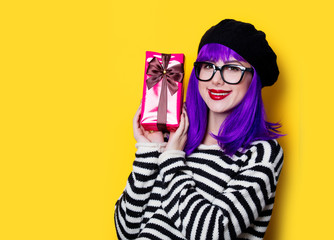 woman in glasses with gift
