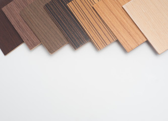 Naklejka na ściany i meble Samples of veneer wood on white background. interior design select material for idea. 