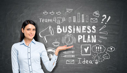 Woman showing business plan sketch