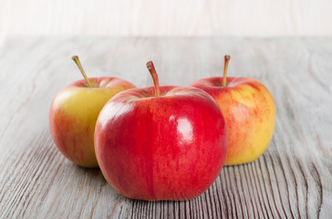 Three red apples