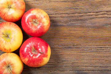 Apples on a wooden background