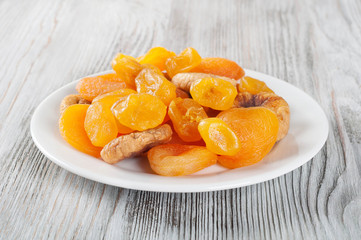 Fruits in white plate.