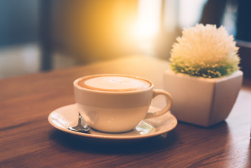 Coffee cup in coffee shop - vintage style