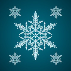 Snoflake_24 Christmas element: opaque crystal snowflakes on a dark turquoise background.
