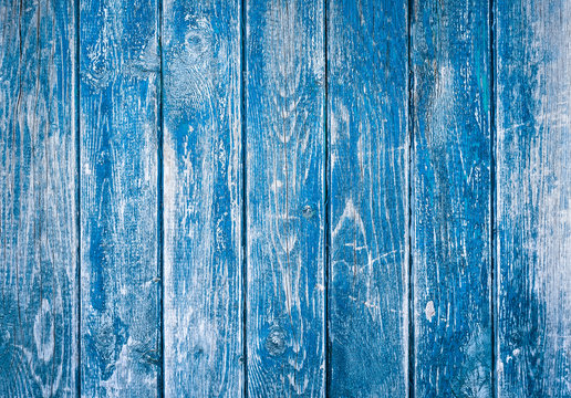 Dark blue wood texture background with old peeling paint