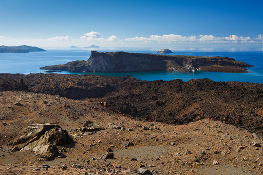 View of Palia Kameni island from Nea Kameni island, Greece.