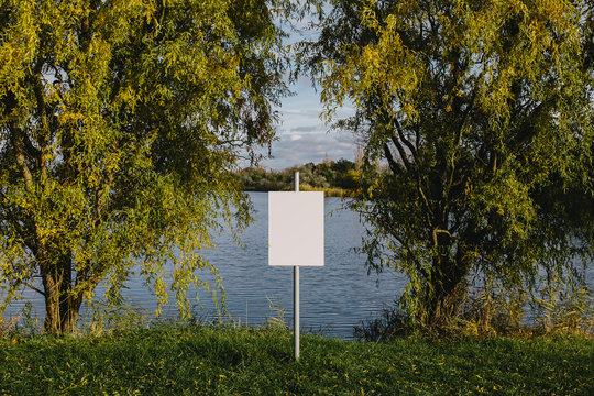 blank sign on the lake. Empty space for text, copy space. Mock up