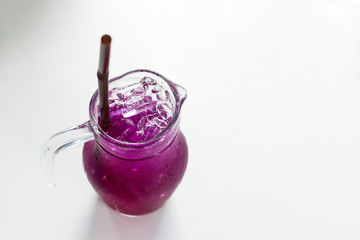 Butterfly pea juice on white background