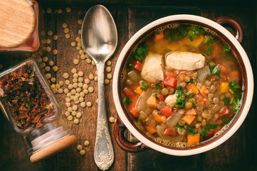 Hot soup with green lentil, chicken, vegetables and spices.