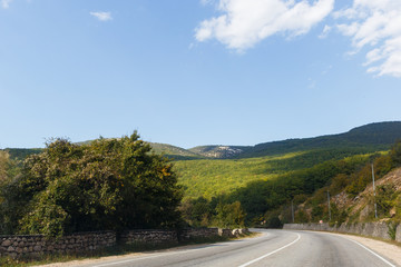 Naklejka premium Scenic mountain landscape with road