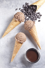 Chocolate ice cream cones and chocolate chips.