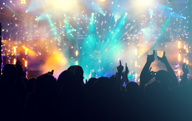 Fototapeta na wymiar Cheering crowd and fireworks - New Year concept