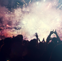Fototapeta premium Cheering crowd and fireworks - New Year concept