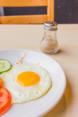Fried Egg and pepper, breakfast on the table