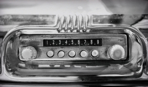 Old radio in retro car.