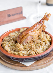 Sliced turkey drumstick and cabbage