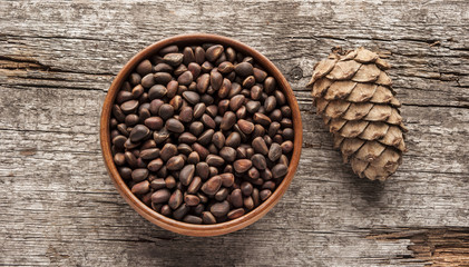 Pine cones on wood