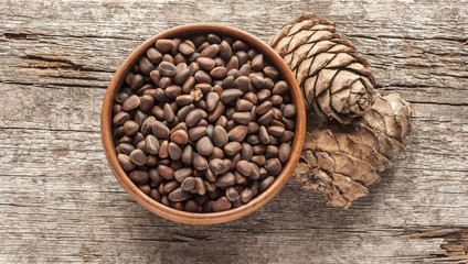 Pine cones on wood