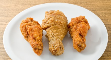 Delocious Fried Chicken Wings on White Dish