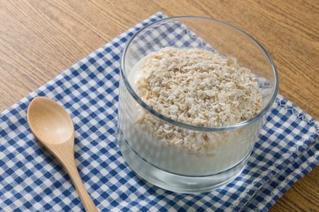 Homemade Yoghurt with Porridge Oats in Glass Cup