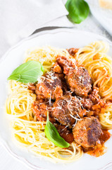 Hearty spaghetti with meatballs in tomato sauce