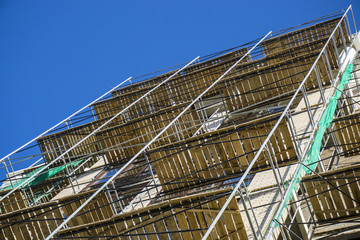 Metal girder extensive scaffolding providing platforms for stage structure support
