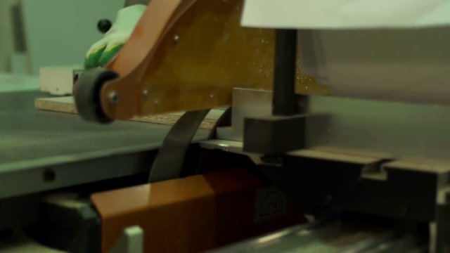 furniture production wizard cuts the wood element