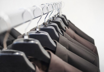 Rows of men's suit jackets