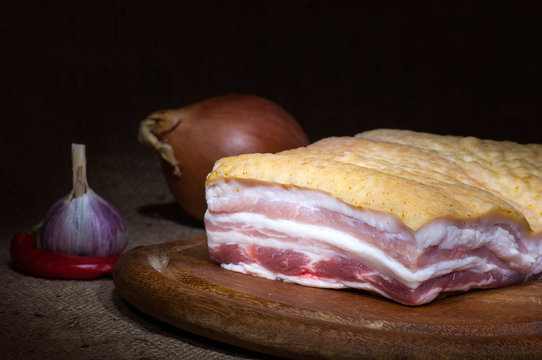 Salted Fatback (streak of lean) on cutting board