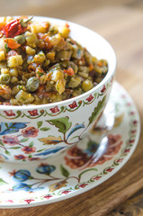 Eggplant caviar with tomato onion sweet chilli and capers