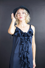 cute young blond woman in a hat