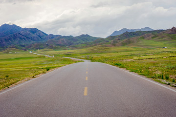 Road thru the mountains at Sayram lake, Xinjiang Uyghur autonomous region, China