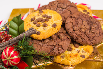Christmas chocolate cookies on golden plate