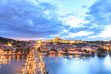 Fototapeta na wymiar Prague caste and the Charles bridge at dusk
