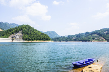 The lake and mountains scenery with blue sky