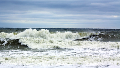 Fototapeta na wymiar Storm. Big waves at sea near the beach
