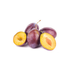 Heap of raw violet plums, isolated