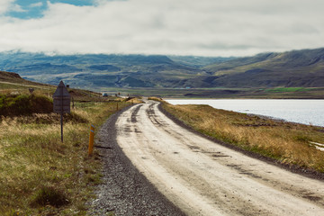 Icelandic landscape with a street and a lake