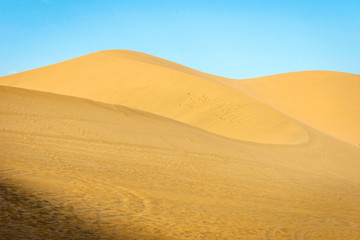 Fototapeta na wymiar Colorful sand dunes in Gobi desert, Dunhuang, China