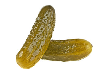 Pickled cucumbers on white background